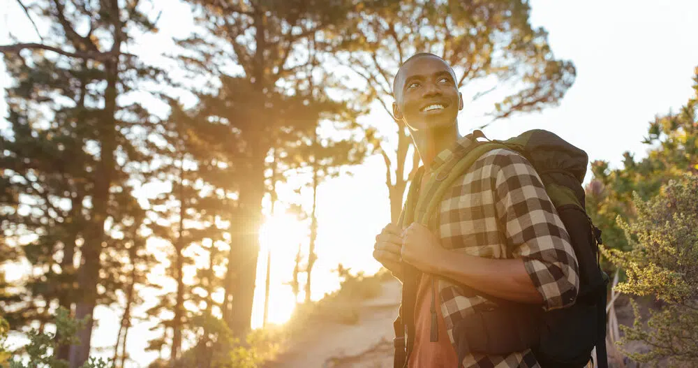 Man hiking outdoors with love for himself