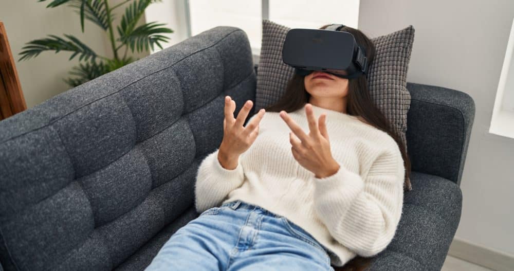woman sitting on couch for virtual reality therapy