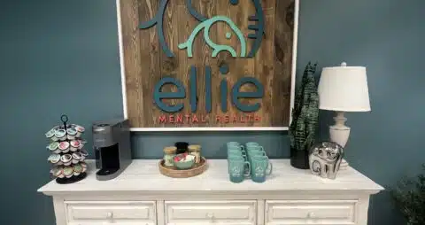 Ellie Mental Health Centennial, CO Clinic Lobby Wooden Sign