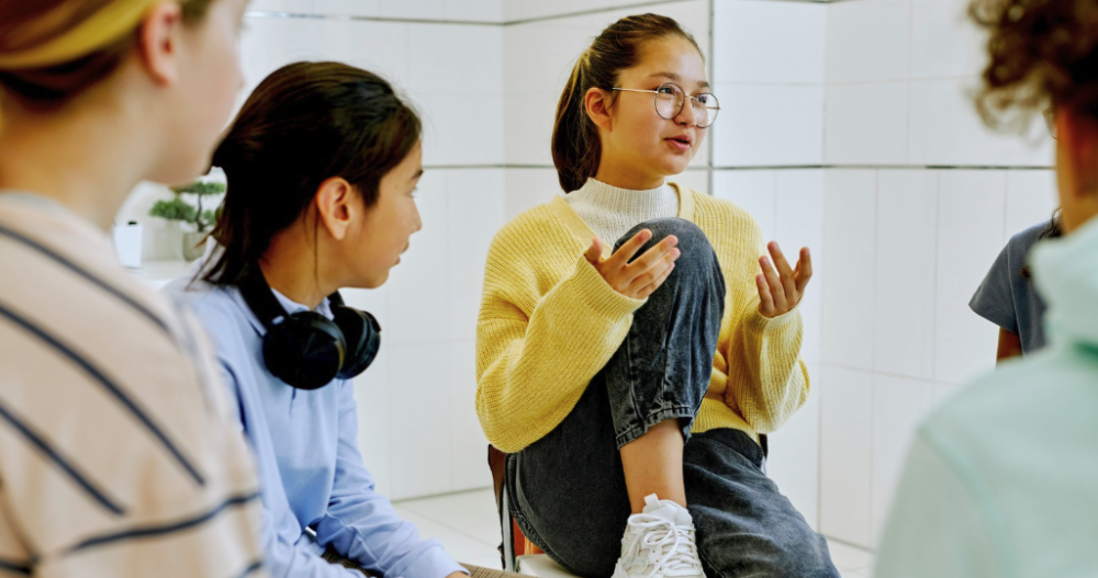 Group of teens at a group therapy session