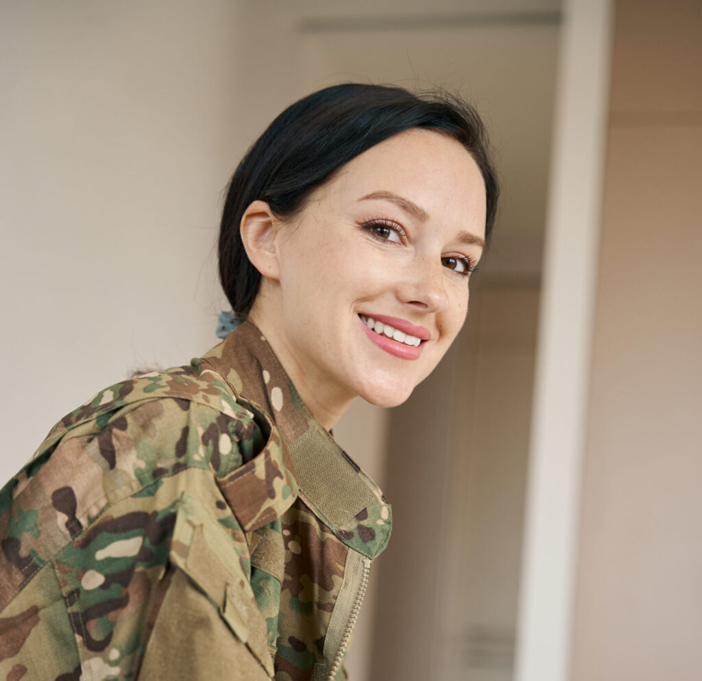 Portrait of a young woman in a military uniform