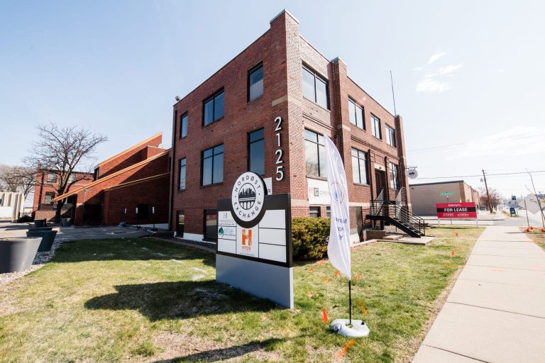 An exterior image of a commercial office building in Minneapolis, Minnesota where an Ellie Mental Health Therapy & Psychiatry Clinic is located.