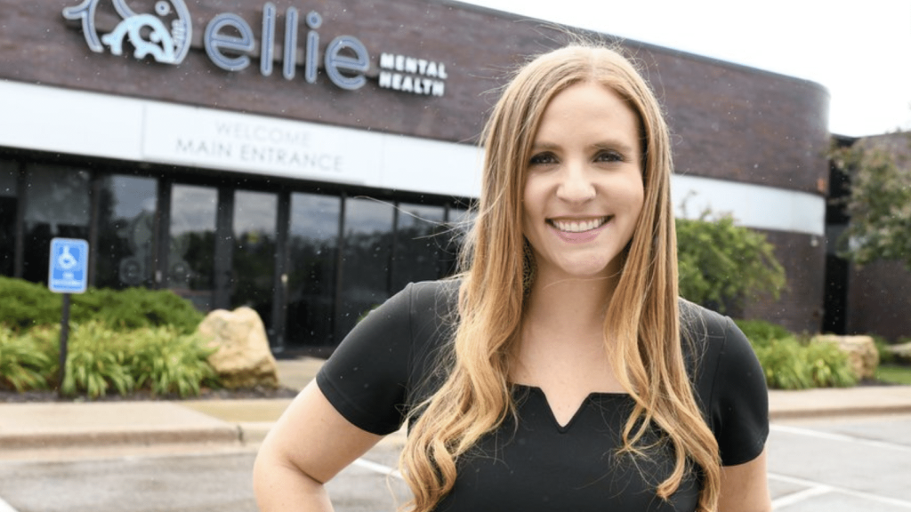 Ellie Mental Health Founder and CEO Erin Pash standing outside the Mendota Heights, MN Clinic