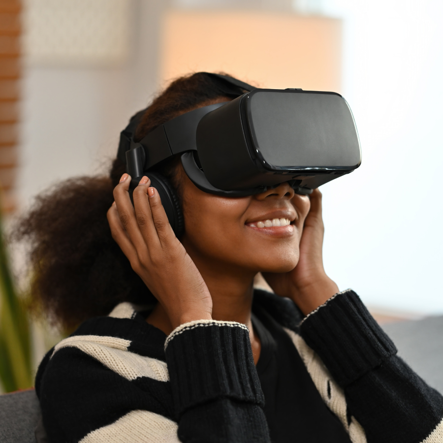 African american girl with virtual reality glasses on in a therapeutic setting