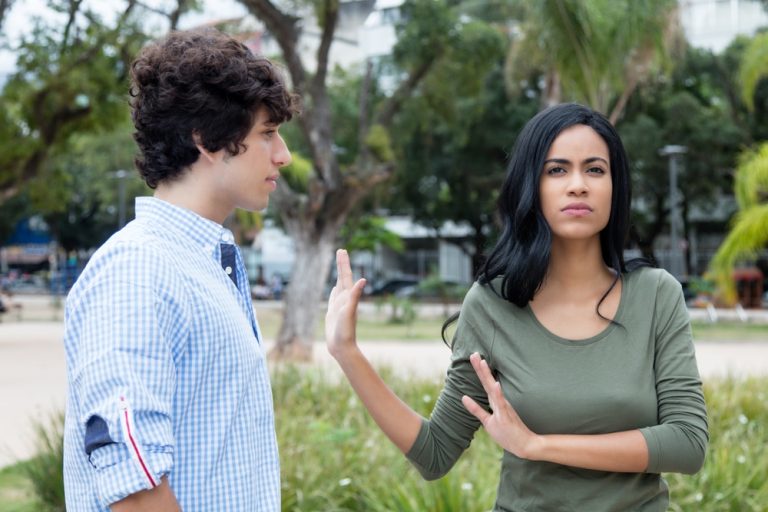 Man being rejected by woman in a relationship