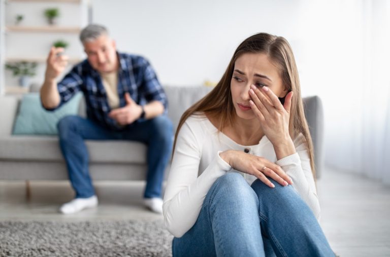 Woman being gaslit by man