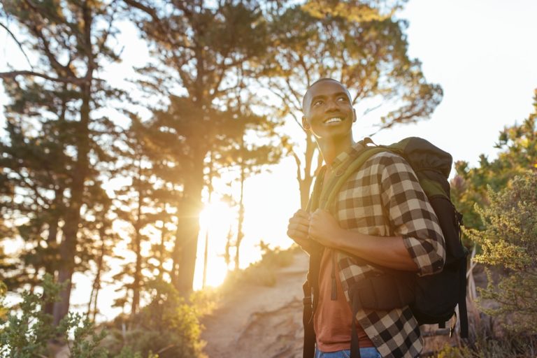 Man hiking outdoors with love for himself