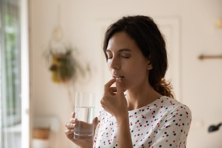 Woman taking psychiatric medications for her mental health