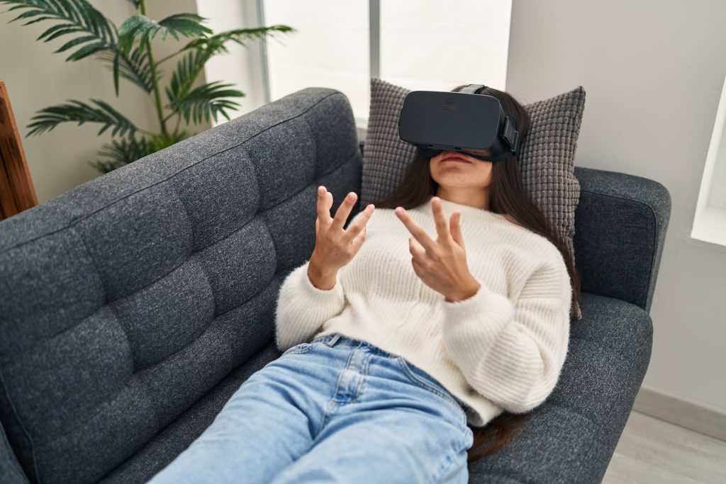 woman sitting on couch for virtual reality therapy