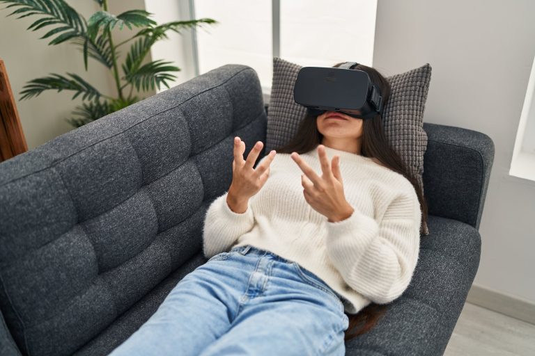 woman sitting on couch for virtual reality therapy