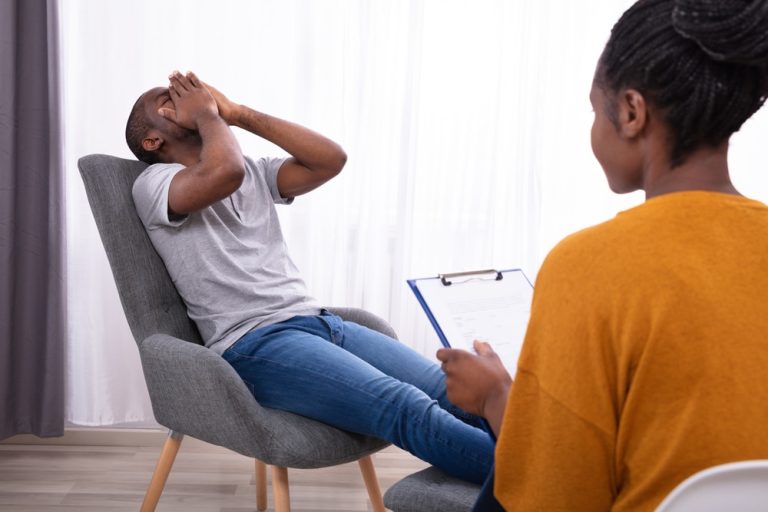 Man in rough therapy session
