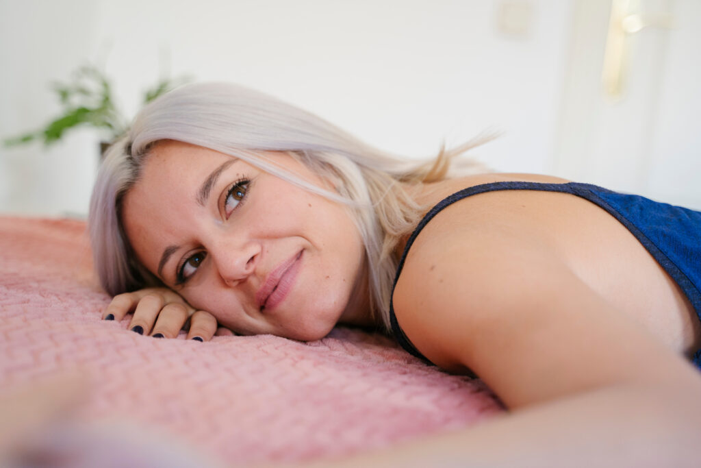 Woman laying down and doing yoga