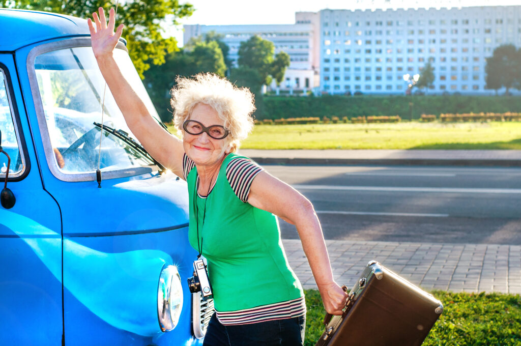 Elderly woman dancing outside