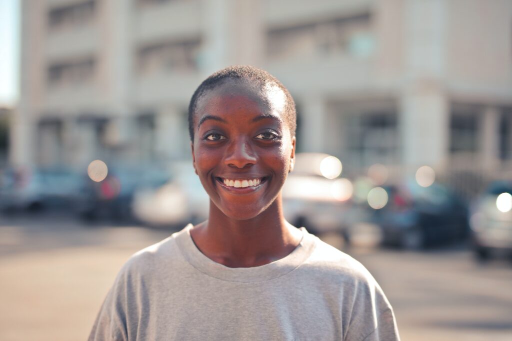 Woman standing outside smiling for the camera